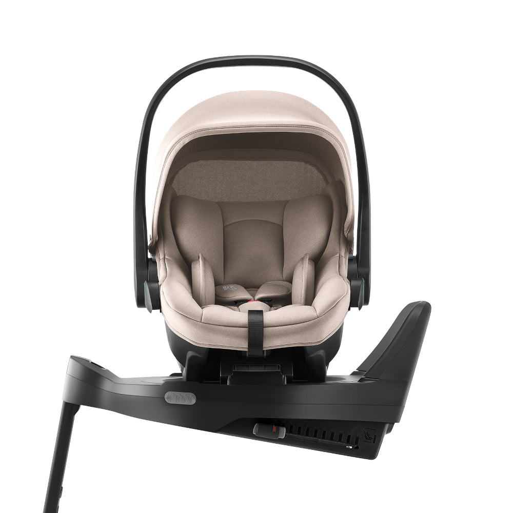 Britax Römer Baby-Safe Core infant carrier car seat in chai beige, on Vario ISOfix base