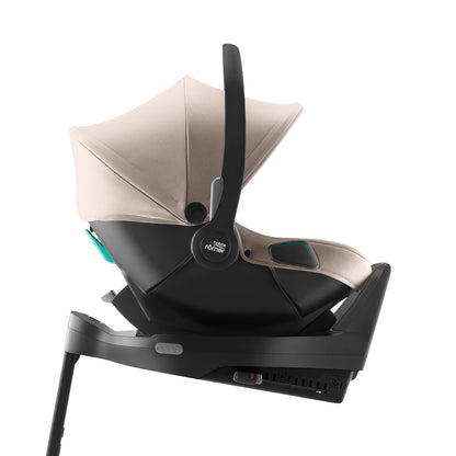 Britax Römer Baby-Safe Core infant carrier car seat in chai beige, on ISOfix base