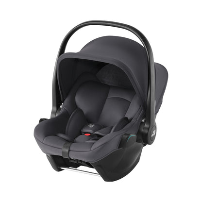 Britax Römer Baby-Safe Core infant carrier car seat in midnight grey, on Vario ISOfix base