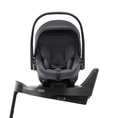 Britax Römer Baby-Safe Core infant carrier car seat in midnight grey, on Vario ISOfix base