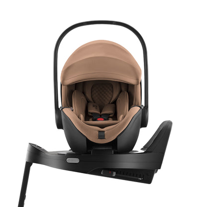 Britax-Römer Baby-Safe Pro infant carrier car seat in Warm Caramel on Vario 5Z ISOfix base