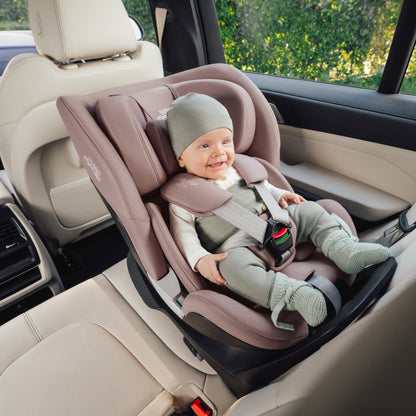 Britax-Römer Swivel ISOfix rear facing car seat in Dusty Rose, baby in car